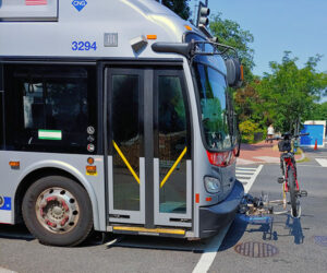 Photo of the front of a Metrobus with a bike rack on the front. 