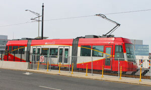 DC Streetcar car 203 arriving at the "Union Station" terminus of the H Street/Benning Road Line, located on the Hopscotch Bridge (also known as the H Street Bridge) between 1st and 2nd Street, NE, in Washington D.C. The line opened in February 2016. Car 203, originally numbered 13-003, was built in 2013 by United Streetcar, of Oregon. Photo: Elvert Barnes, 2017