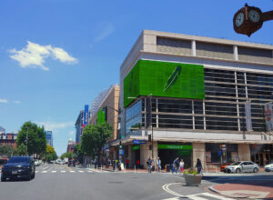 Large digital signage placed on the Capitol One Arena building at the intersection of 7th and F Streets NW in Washington DC.