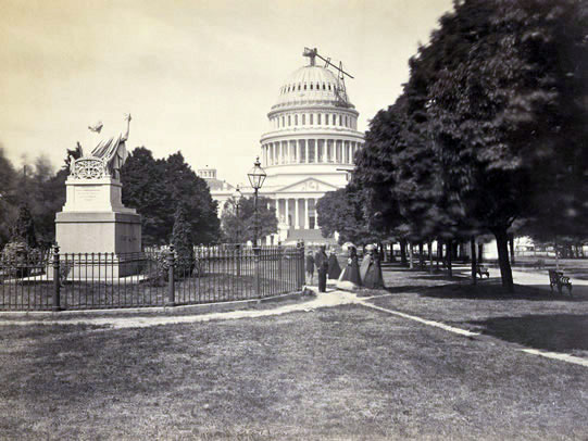 Black and white photo showing the building process of the US Capitol building.