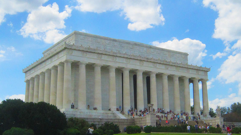 Picture of Lincoln Memorial with tourists visiting.